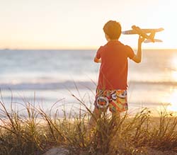 Kid with a plane